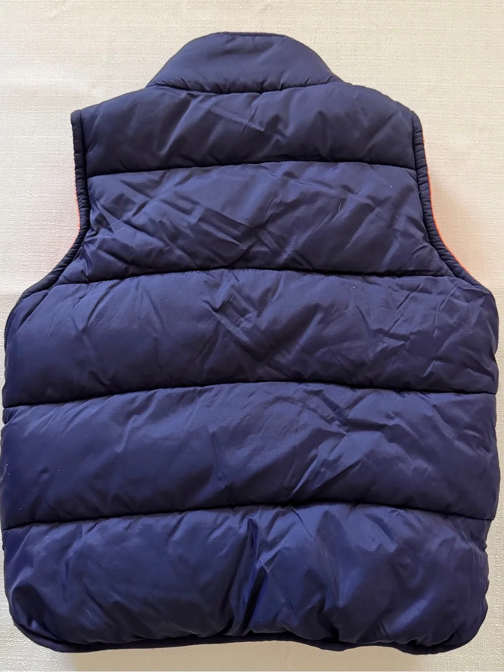 Mini Boden navy blue puffer vest with orange lining